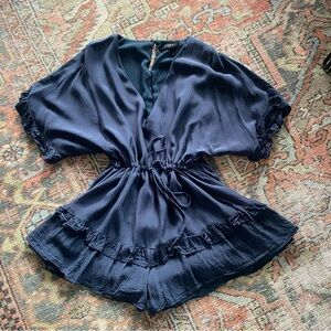 Storia Flowy Navy Romper